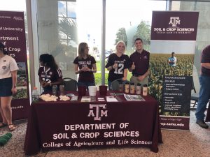 students by department of soil and crop sciences booth