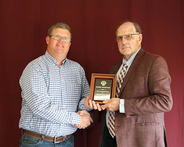 Daniel Hathcoat standing with David Baltensperger, professor and department head.
