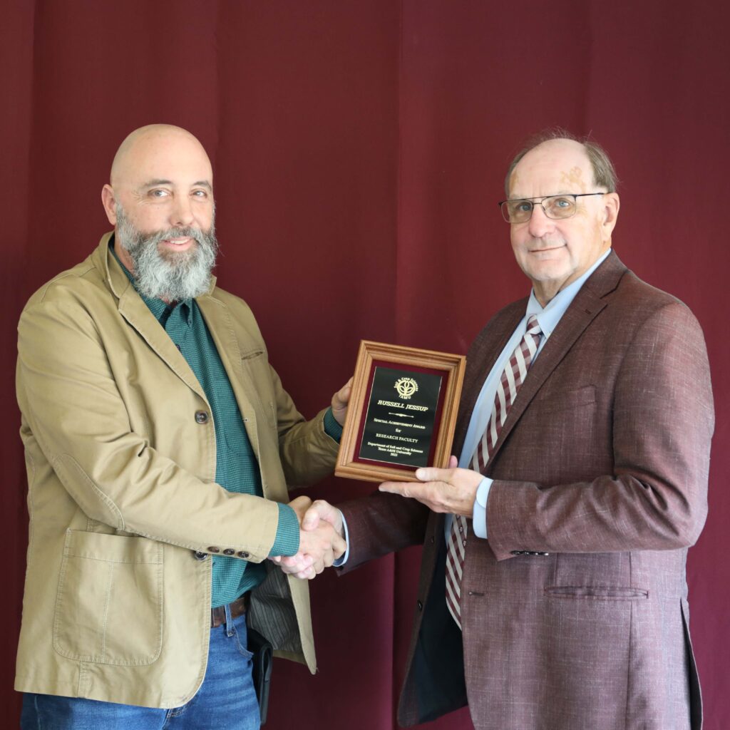 Russell Jessup, Ph.D., standing with David Baltensperger, Ph.D., professor and department head.