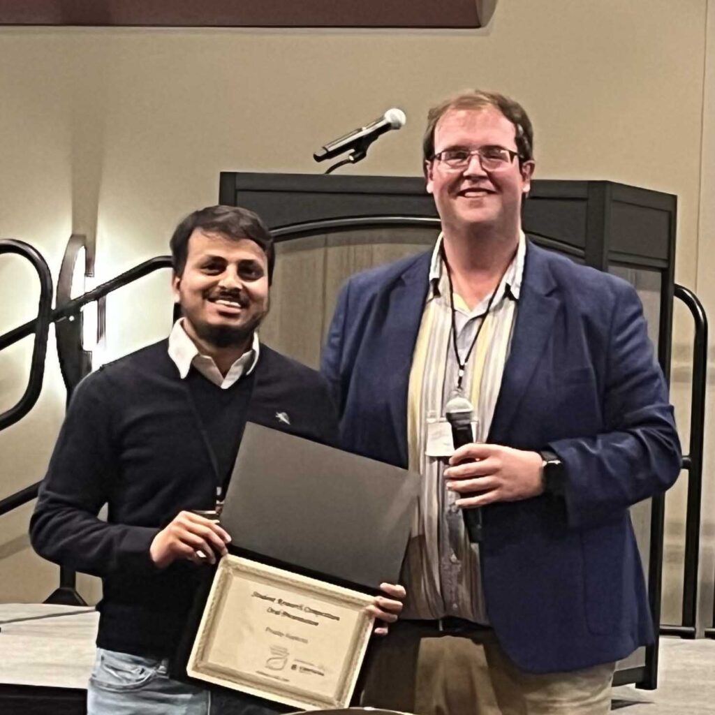 Pradip Sapkota standing with Mason Marshall